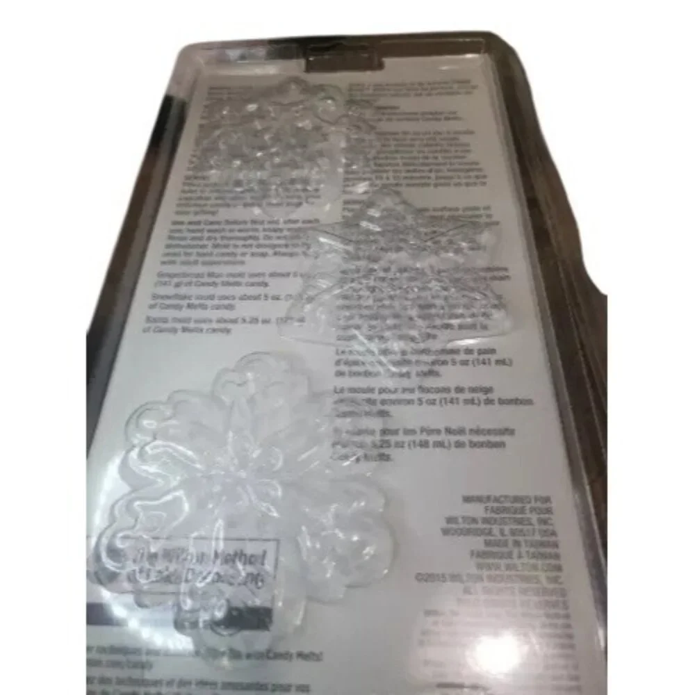 Wilton Christmas 3-Piece Candy Mold Set Snowflakes Gingerbread Men Santa Shapes